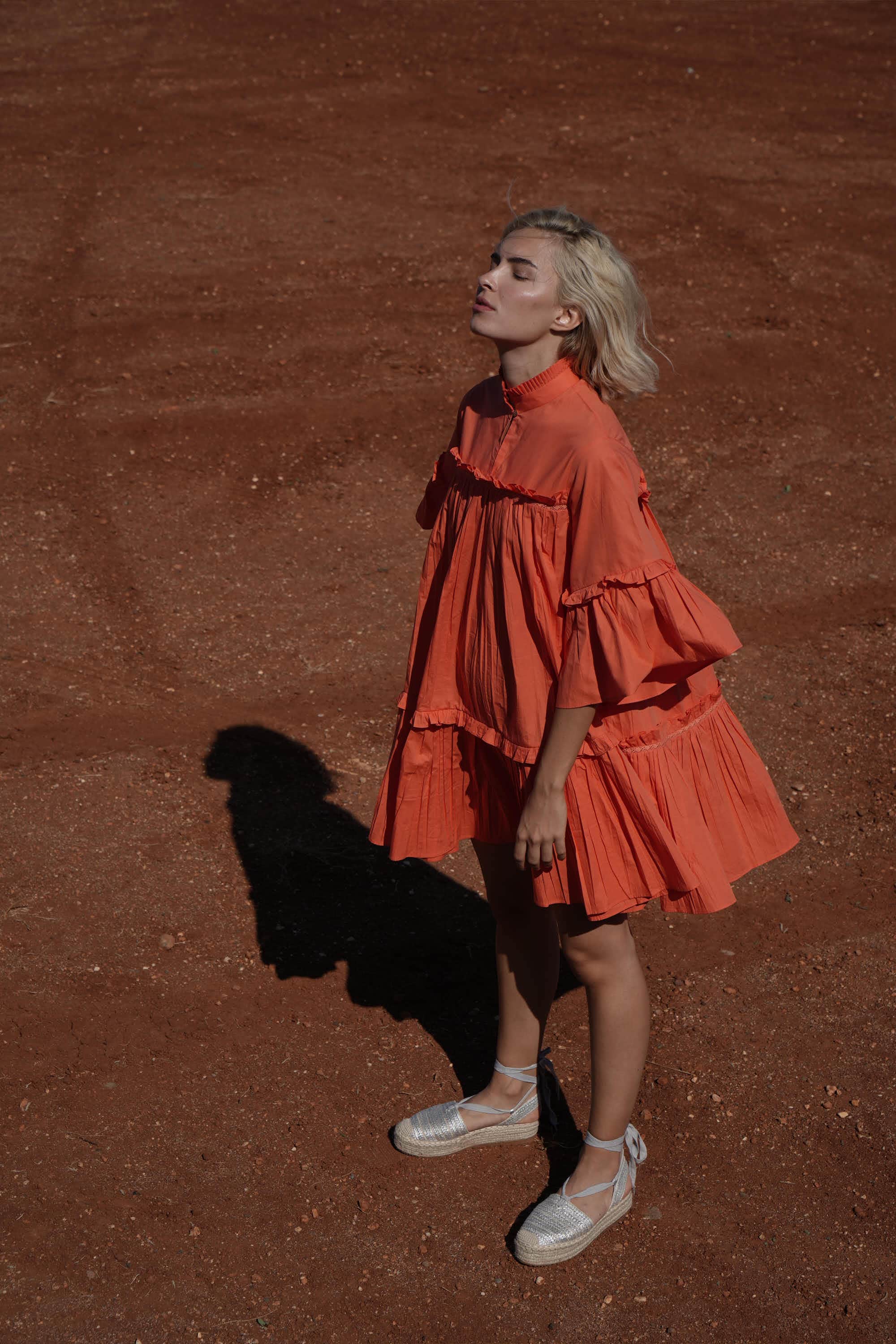 A model rocks a tiered coral dress - a cool pick for Holi (Photo: Instagram/ShrutiSancheti) A model rocks a tiered coral dress - a cool pick for Holi (Photo: Instagram/ShrutiSancheti)