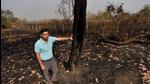 Adityavardhan Pathak, owner of a commercial farm in Thane district, shows a part of his land that was burnt during a wild fire in the beginning of March. “Every year, between February and May, fires break out,” he said. (Satish Bate/HT PHOTO) Adityavardhan Pathak, owner of a commercial farm in Thane district, shows a part of his land that was burnt during a wild fire in the beginning of March. “Every year, between February and May, fires break out,” he said. (Satish Bate/HT PHOTO)