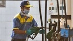 A petrol pump employee wearing a face mask while attending to a customer in Trinagar, New Delhi.(Sanchit Khanna/HT File Photo) A petrol pump employee wearing a face mask while attending to a customer in Trinagar, New Delhi.(Sanchit Khanna/HT File Photo)