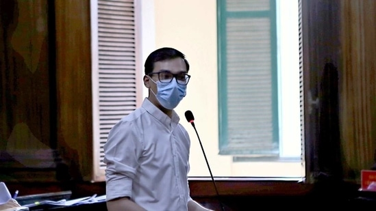 Vietnam Airlines flight attendant Duong Tan Hau, addresses the court before being found guilty of violating Covid-19 quarantine rules and handed a two year suspended prison term in Ho Chi Minh City, Vietnam. (Reuters)