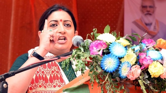 Union Minister of Women and Child Developement Smriti Irani addresses a public rally ahead of the second phase of Assam Assembly election at Barbhag, in Nalbari on Tuesday. (ANI Photo)