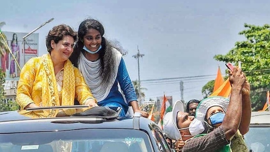 Congress supporter clicks a selfie with party leader Priyanka Gandhi Vadra election campaigning at Karunagappally in Kollam district on Tuesday.