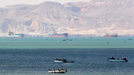Ships and boats seen at the entrance of Suez Canal, on March 28. At least 369 vessels are waiting to transit the canal, including dozens of container ships, bulk carriers, oil tankers and liquefied natural gas (LNG) or liquefied petroleum gas (LPG) vessels, Rabie said during the news conference, Reuters reported.(Mohamed Abd El Ghany / REUTERS)