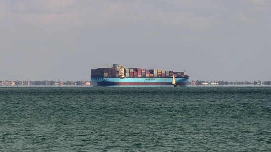 A ship is anchored outside the Suez Canal, near Ismailia, on March 29. Shipping group Maersk said the knock-on disruptions to global shipping could take weeks or months to unravel, Reuters reported.(Hanaa Habib / REUTERS)