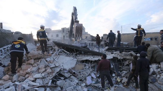 FILE - In this Jan. 15, 2020 file photo, emergency services look for survivors after airstrikes in the city of Idlib, Syria. (AP Photo/Ghaith Alsayed, File) FILE - In this Jan. 15, 2020 file photo, emergency services look for survivors after airstrikes in the city of Idlib, Syria. (AP Photo/Ghaith Alsayed, File)