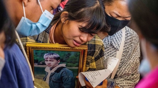 A relative cries during the funeral of a protester, who died amid a crackdown by security forces on demonstrations against the military coup, in Taunggyi in Myanmar's Shan state. (AFP) A relative cries during the funeral of a protester, who died amid a crackdown by security forces on demonstrations against the military coup, in Taunggyi in Myanmar's Shan state. (AFP)