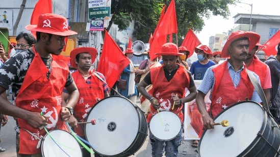 Kolkata: Supporters of CPI(M) MLA and Sonjukta Morcha nominated candidate from Jadavpur Assembly constituency Sujan Chakraborty play drums, during his door-to-door election campaign for the West Bengal assembly polls, in Kolkata, Tuesday, March 30, 2021. (PTI Photo)(PTI03_30_2021_000035A)(PTI) Kolkata: Supporters of CPI(M) MLA and Sonjukta Morcha nominated candidate from Jadavpur Assembly constituency Sujan Chakraborty play drums, during his door-to-door election campaign for the West Bengal assembly polls, in Kolkata, Tuesday, March 30, 2021. (PTI Photo)(PTI03_30_2021_000035A)(PTI)
