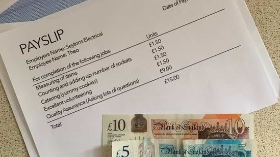 A picture of the tiny pay slip that acknowledges little Theo’s work and some money sent with it.(Twitter/@LauraNicoleAnd2)