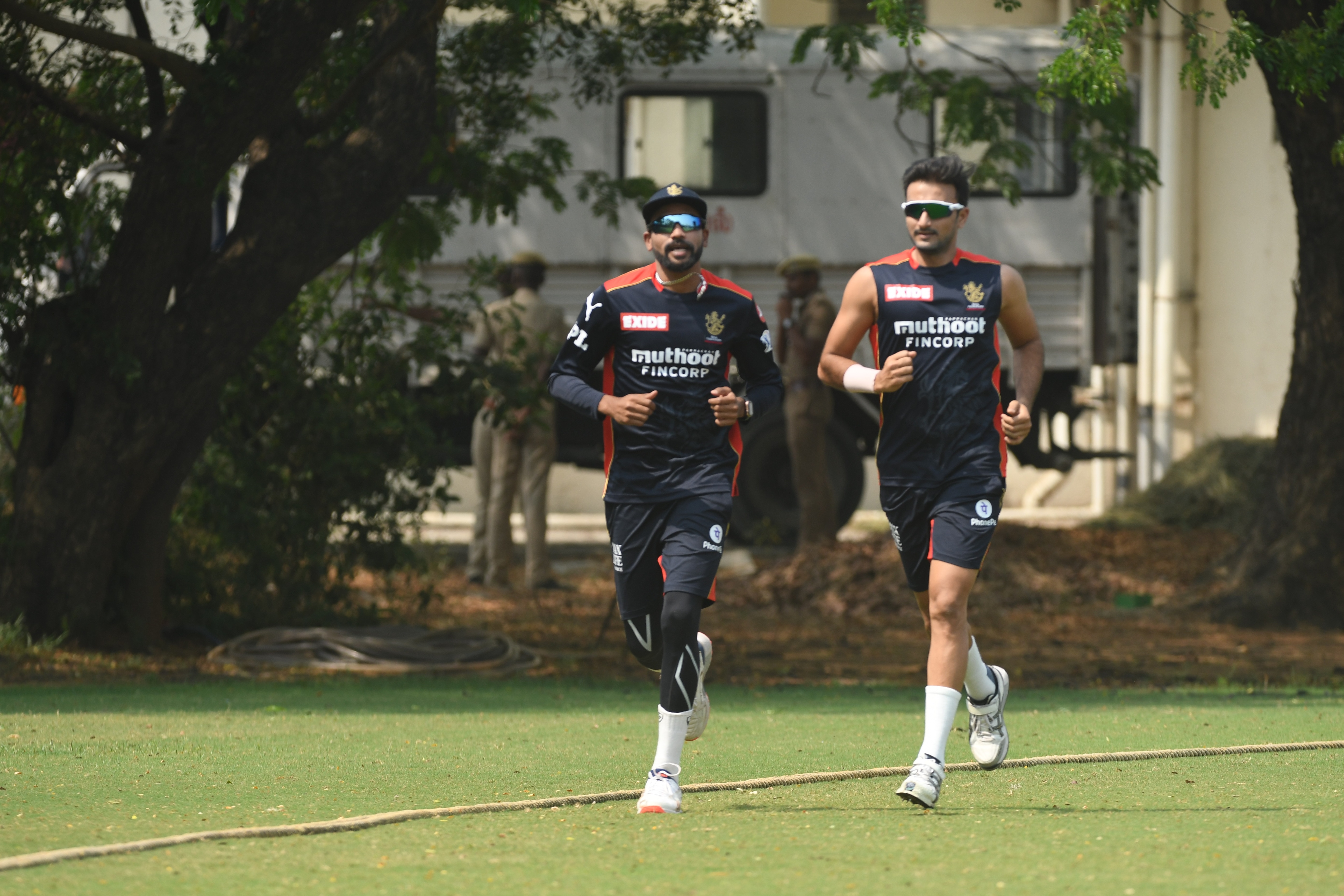 RCB players Mohammed Siraj and Harshal Patel during the first training session ahead of IPL 2021 RCB players Mohammed Siraj and Harshal Patel during the first training session ahead of IPL 2021