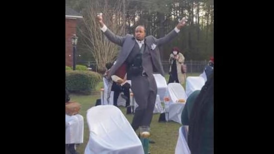 The image shows a man at his cousin's wedding.(screengrab)