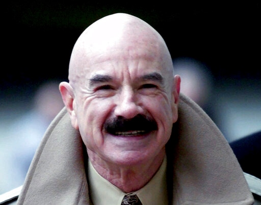 G. Gordon Liddy arriving at Baltimore's federal courthouse. (AP) G. Gordon Liddy arriving at Baltimore's federal courthouse. (AP)