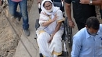 West Bengal CM Mamata Banerjee being escorted by the CRPF jawans from the polling booth, in Nandigram on Thursday. (ANI Photo)