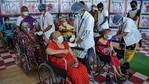 Healthcare workers administer the first dose of Covid-19 vaccine to senior citizens, at a hospital in Thane, on Saturday.(PTI Photo) Healthcare workers administer the first dose of Covid-19 vaccine to senior citizens, at a hospital in Thane, on Saturday.(PTI Photo)