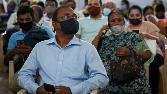 People seen inside an observation room after getting inoculated with a dose of Covid-19 vaccine, in Mumbai, on April 1. More than 6.5 crore vaccine doses have been administered across the country so far to frontline workers, healthcare workers, those above 60 and for people aged above 45 with specified co-co-morbid conditions, PTI reported.(Punit Paranjpe / AFP)