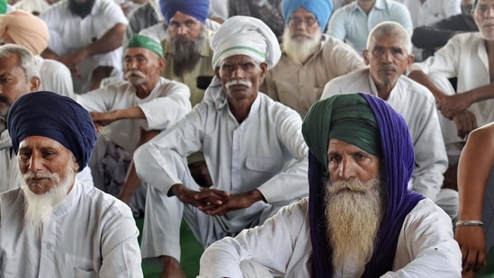 Farmers sitting on a demonstration during the ongoing farmers' protest at the Delhi-Ghazipur border, in New Delhi Farmers sitting on a demonstration during the ongoing farmers' protest at the Delhi-Ghazipur border, in New Delhi