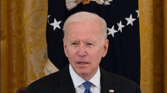 US President Joe Biden holds his first cabinet meeting in the East Room of the White House in Washington, DC, on Thursday (AFP) US President Joe Biden holds his first cabinet meeting in the East Room of the White House in Washington, DC, on Thursday (AFP)