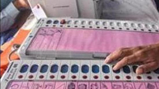 Patna: Electronic Voting Machine (EVM) sealing officers check EVMs and Voter-Verified Paper Audit Trail (VVPATs) ahead of the second phase of Bihar assembly polls, in Patna, Friday, Oct. 30, 2020. (PTI Photo)(PTI30-10-2020_000042A) (PTI)