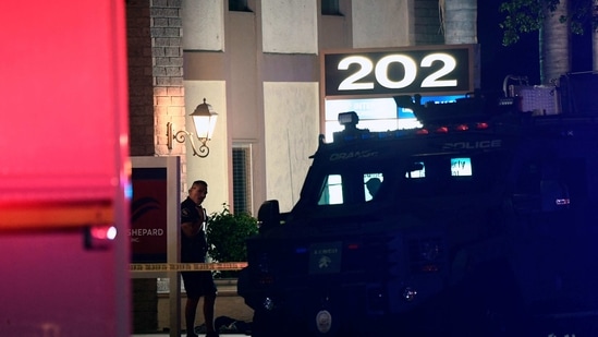 Police Lt. Jennifer Amat says shots were being fired when officers arrived and officers shot the suspect, who was taken to the hospital in unknown condition (Photo by Patrick T. FALLON / AFP) (AFP) Police Lt. Jennifer Amat says shots were being fired when officers arrived and officers shot the suspect, who was taken to the hospital in unknown condition (Photo by Patrick T. FALLON / AFP) (AFP)