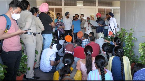 Students protesting outside the administration block on the Panjab University campus in Chandigarh on Thursday. (Ravi Kumar/HT) Students protesting outside the administration block on the Panjab University campus in Chandigarh on Thursday. (Ravi Kumar/HT)