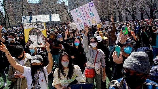 People take part in a rally against hate and the rising violence against Asians living in the U.S., at Columbus Park in the Chinatown section of the Manhattan borough of New York, on Sunday, March 21, 2021. (AP Photo/Eduardo Munoz Alvarez) (AP) People take part in a rally against hate and the rising violence against Asians living in the U.S., at Columbus Park in the Chinatown section of the Manhattan borough of New York, on Sunday, March 21, 2021. (AP Photo/Eduardo Munoz Alvarez) (AP)