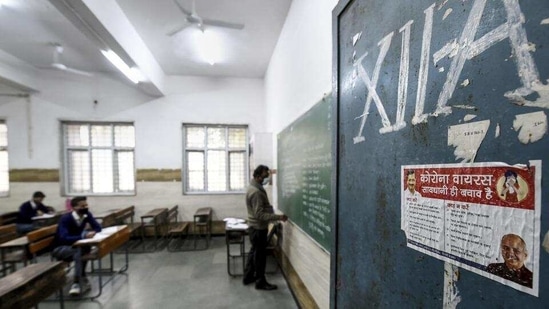 A teacher takes a class in a Delhi school in January. (File photo)(PTI)