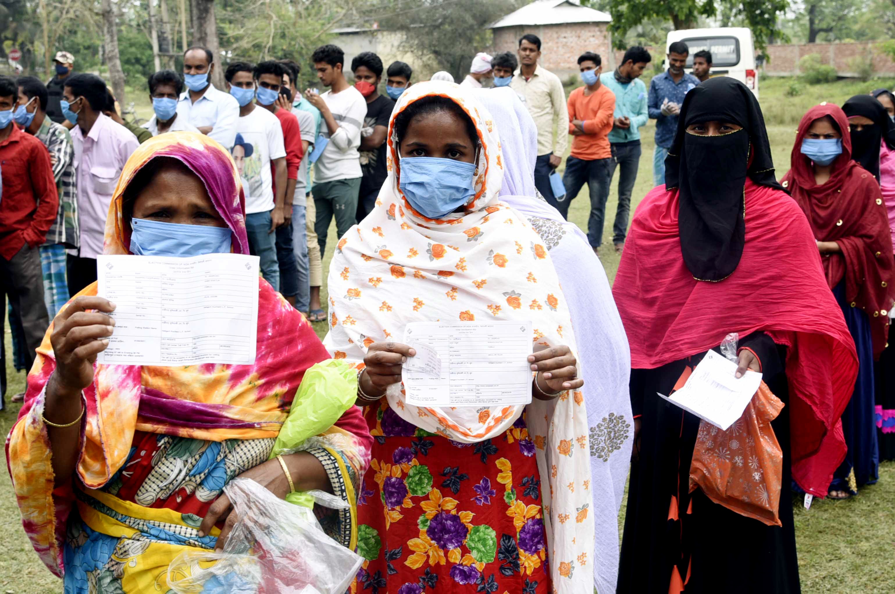 Female voters show their Voter Slip before casting their votes at a polling station during the second phase of Assam Assembly Elections at Mayong in Morigaon on Thursday. (ANI Photo) Female voters show their Voter Slip before casting their votes at a polling station during the second phase of Assam Assembly Elections at Mayong in Morigaon on Thursday. (ANI Photo)