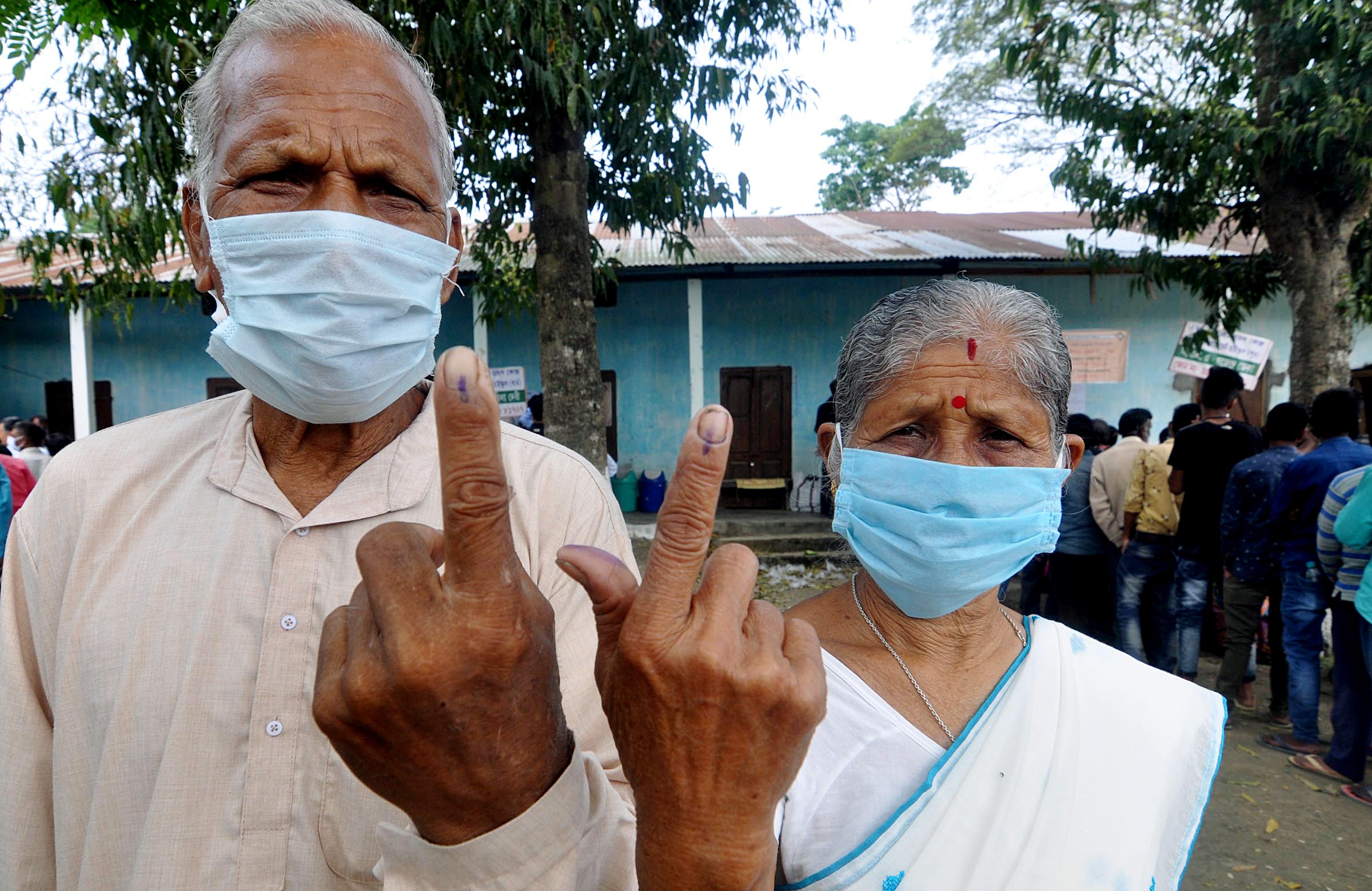 An elderly couple shows their indelible ink-marked fingers after casting vote at a polling station in the second phase of Assam Assembly polls, in Mangaldal, Darrang district on Thursday. (ANI Photo) An elderly couple shows their indelible ink-marked fingers after casting vote at a polling station in the second phase of Assam Assembly polls, in Mangaldal, Darrang district on Thursday. (ANI Photo)