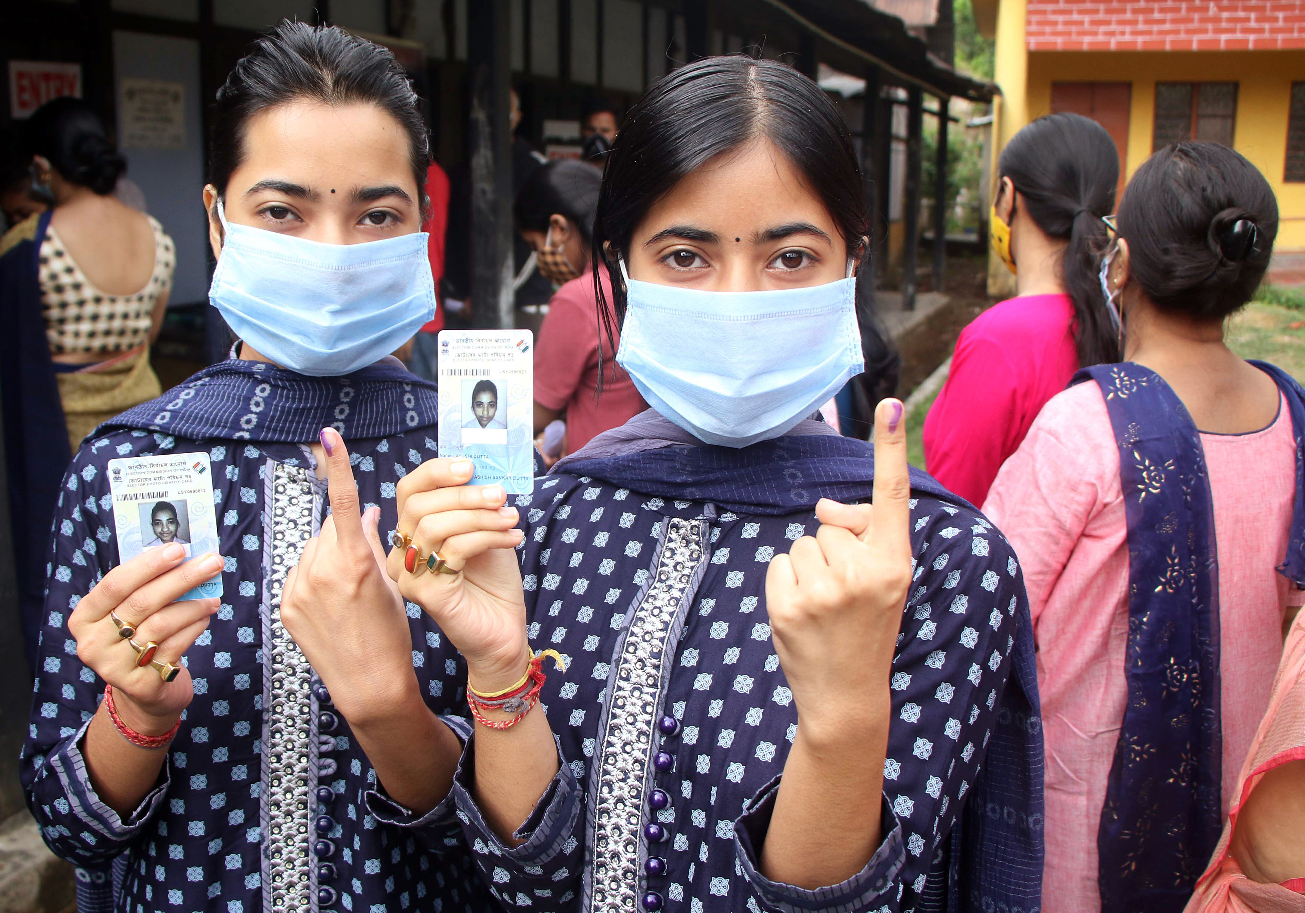 Female voters show their fingers marked with indelible ink after casting vote outside a polling station during the 2nd phase of Assam Assembly polls, in Silchar on Thursday. (ANI Photo) Female voters show their fingers marked with indelible ink after casting vote outside a polling station during the 2nd phase of Assam Assembly polls, in Silchar on Thursday. (ANI Photo)