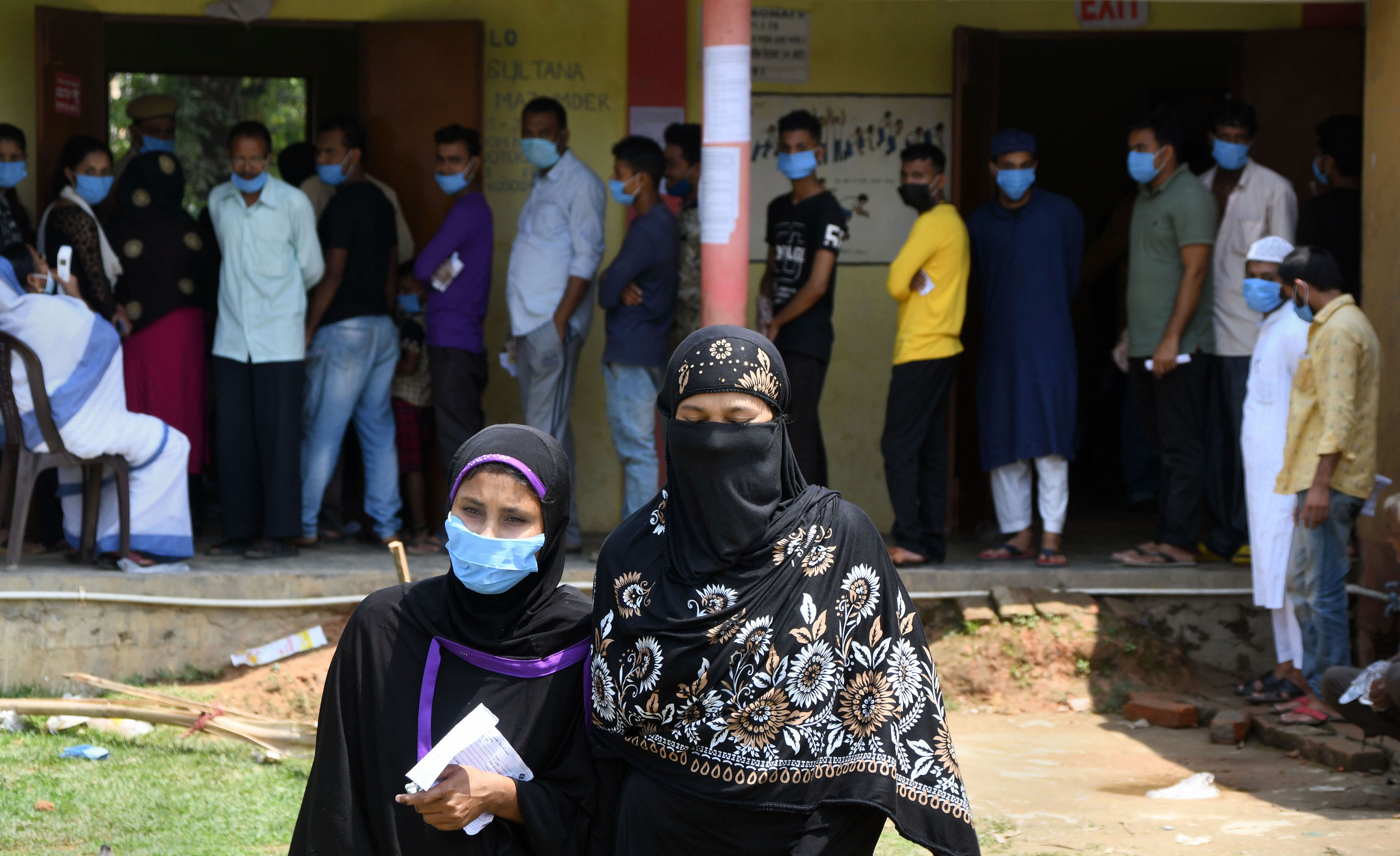 Members of the Muslim community leave a polling station after casting their votes during the second phase of Assam Assembly Elections, at Silchar in Cachar district, Thursday, April 1, 2021. (PTI) Members of the Muslim community leave a polling station after casting their votes during the second phase of Assam Assembly Elections, at Silchar in Cachar district, Thursday, April 1, 2021. (PTI)