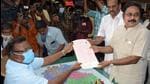 Amma Makkal Munnetra Kazhagam (AMMK) general secretary TTV Dhinakaran files his nomination from Kovilpatti assembly constituency for upcoming elections. (PTI) Amma Makkal Munnetra Kazhagam (AMMK) general secretary TTV Dhinakaran files his nomination from Kovilpatti assembly constituency for upcoming elections. (PTI)