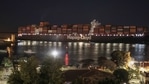 A cargo ship sails through the town of Suez, Egypt, on March 30, 2021. (AP) A cargo ship sails through the town of Suez, Egypt, on March 30, 2021. (AP)