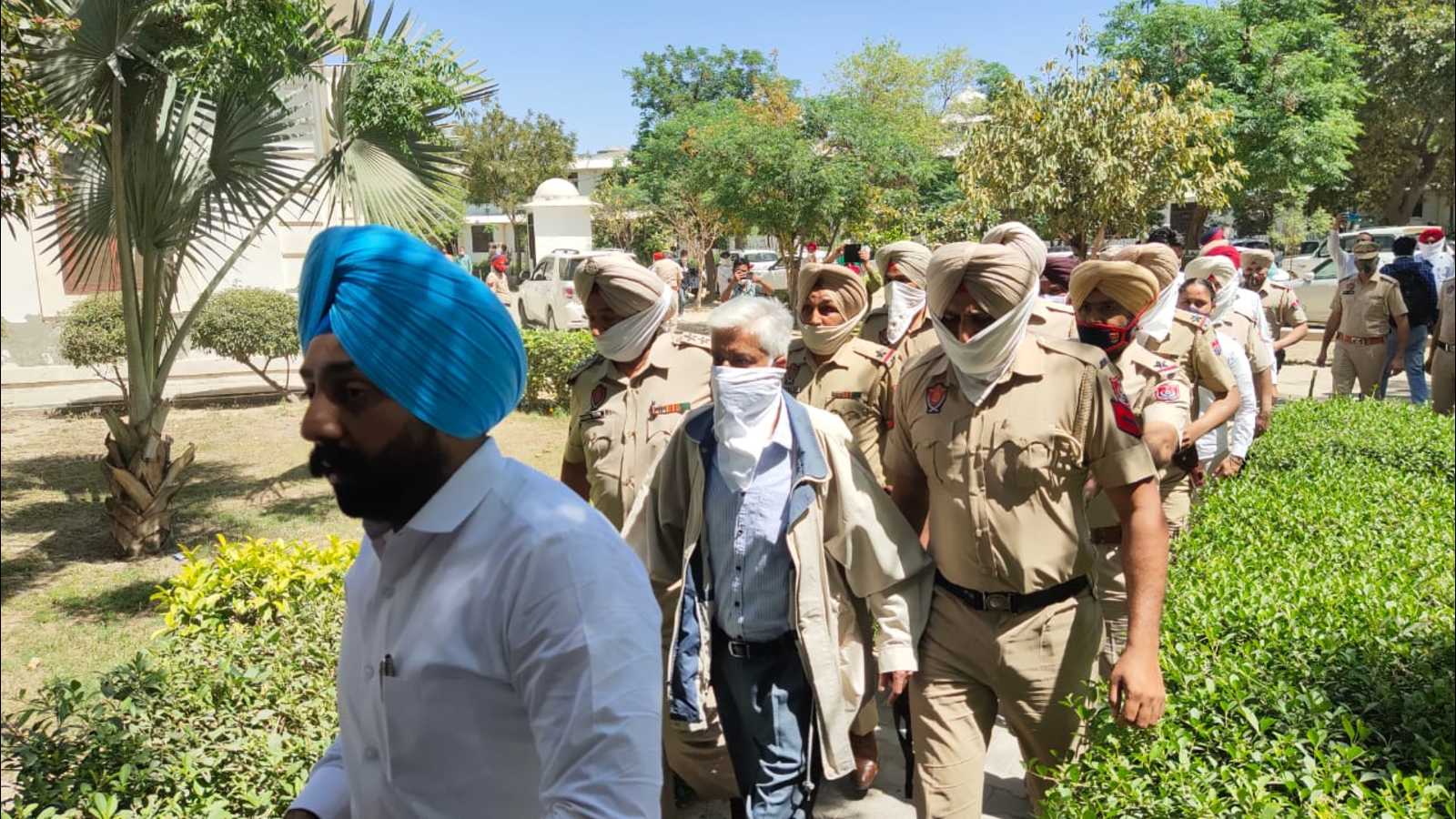 Ex-Punjab DGP Saini, other accused appear in Faridkot court in 2015 police firing cases