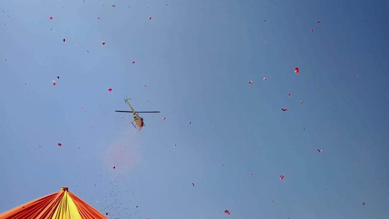 Helicopter showers petals as Akhadas hoist flag on day 2 of Mahakumbh