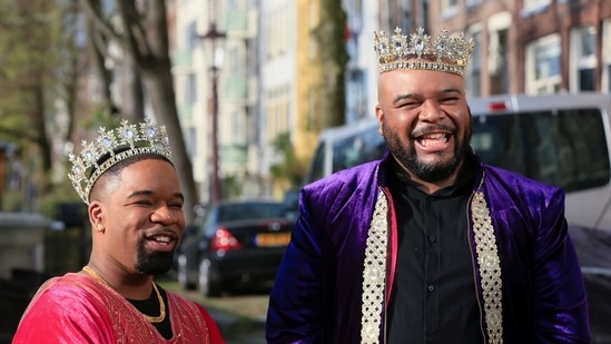 Couple Marvin and Vincent Sabajo-Francis smile during celebrations of the 20th anniversary of the world's first legally-recognised same-sex wedding, in Amsterdam, Netherlands, April 1, 2021. (REUTERS)