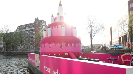 A giant inflatable cake is floated on the canal on the 20th anniversary of the world's first legally-recognised same-sex wedding, in Amsterdam, Netherlands, April 1, 2021. (REUTERS)