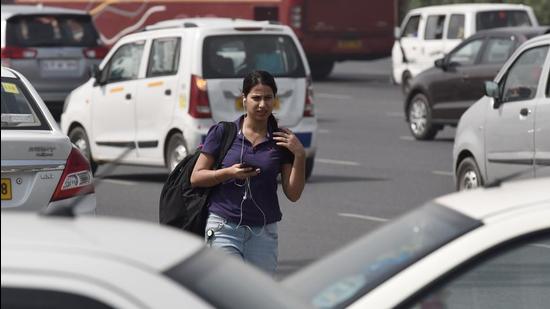 File photo: A commuter looking for app-based cab. (Sanjeev Verma/HT PHOTO) File photo: A commuter looking for app-based cab. (Sanjeev Verma/HT PHOTO)