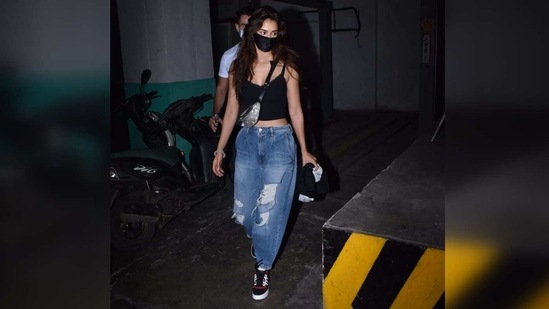 Maintaining the street style vibe throughout, she topped off the look with a pair of black sneakers.(Varinder Chawla)