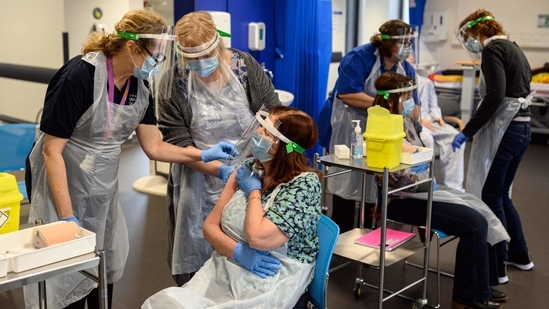 The figures showed the daily growth rate of infections in England was between -4% to 0%, (AFP) The figures showed the daily growth rate of infections in England was between -4% to 0%, (AFP)