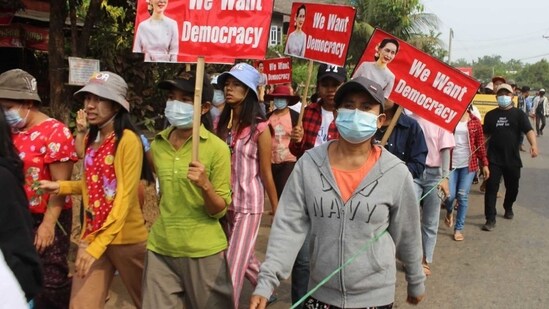 Protesters marching ahead during a demonstration against the military coup in Launglon township in Dawei.(AFP Photo)
