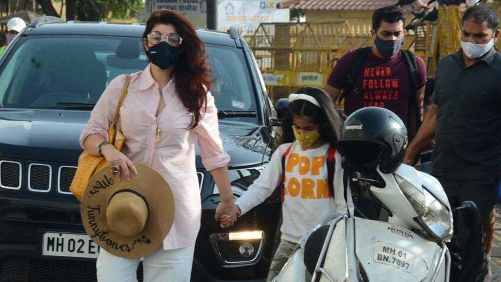 Twinkle Khanna holds Nitara's hand as they embark on weekend getaway. See pics of her customised hat