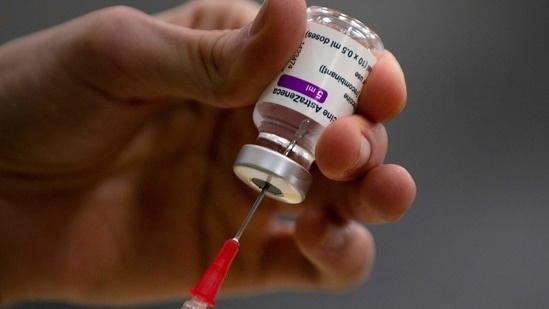 A pharmacist prepares a syringe from a vial of the AstraZeneca coronavirus vaccine during preparations.(AP) A pharmacist prepares a syringe from a vial of the AstraZeneca coronavirus vaccine during preparations.(AP)