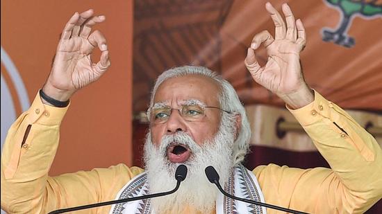Prime Minister Narendra Modi addresses an election rally ahead of the third phase of assembly polls, in Hooghly district on Saturday. (PTI PHOTO.) Prime Minister Narendra Modi addresses an election rally ahead of the third phase of assembly polls, in Hooghly district on Saturday. (PTI PHOTO.)