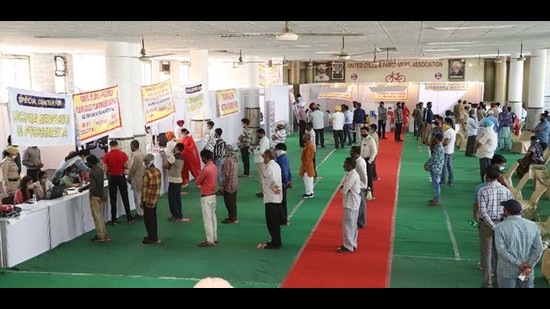 People queuing up for Covid vaccine during a camp at the United Cycle and Parts Manufacturers Association office at Gill Road in Ludhiana on Saturday. (HT Photo) People queuing up for Covid vaccine during a camp at the United Cycle and Parts Manufacturers Association office at Gill Road in Ludhiana on Saturday. (HT Photo)