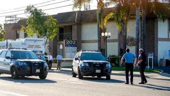 Officials work outside the scene of a shooting. (AP) Officials work outside the scene of a shooting. (AP)