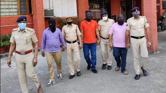 The three accused in police custody in Chandigarh, on Saturday. (HT PHOTO) The three accused in police custody in Chandigarh, on Saturday. (HT PHOTO)