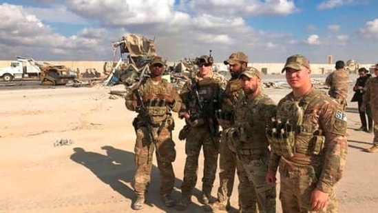 In this Jan. 13, 2020 file photo, U.S. Soldiers stand at a site of Iranian bombing at Ain al-Asad air base in Anbar, Iraq. (AP) In this Jan. 13, 2020 file photo, U.S. Soldiers stand at a site of Iranian bombing at Ain al-Asad air base in Anbar, Iraq. (AP)