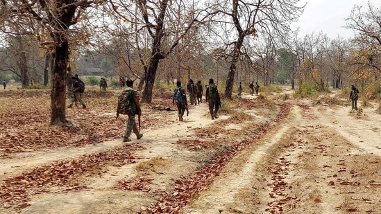 Security force personnel patrol after an attack by Maoist fighters in Bijapur in Chhattisgarh.(Reuters)
