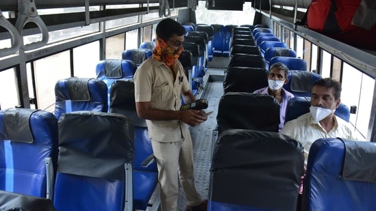 Thane, India - April 03, 2021: Covid-19 havoc has increased in Thane city and the number of state transport buses coming from outside city and state has been reduced so the Khopat bus depot Thanev is not crowded so the number of passengers in the bus has also decreased ,at Thane, Mumbai, India, on Saturday, April 03, 2021. ( Praful Gangurde / HT Photo ) Thane, India - April 03, 2021: Covid-19 havoc has increased in Thane city and the number of state transport buses coming from outside city and state has been reduced so the Khopat bus depot Thanev is not crowded so the number of passengers in the bus has also decreased ,at Thane, Mumbai, India, on Saturday, April 03, 2021. ( Praful Gangurde / HT Photo )