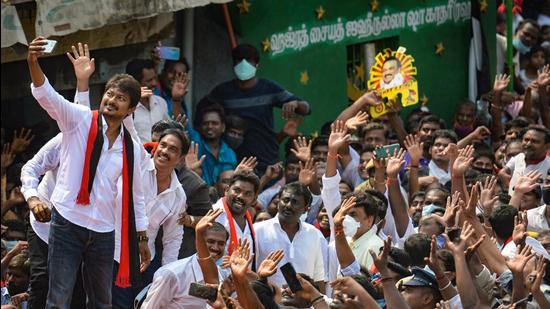 DMK youth wing leader Udhayanidhi Stalin and party candidate during an election campaign on Sunday. (PTI) DMK youth wing leader Udhayanidhi Stalin and party candidate during an election campaign on Sunday. (PTI)