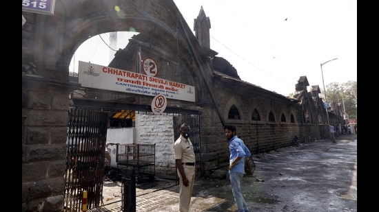 PWD superintendent Atul Chavan assured stall holders that the restoration and repair work for the preservation of the British era heritage structure will begin by month end (HT PHOTO) PWD superintendent Atul Chavan assured stall holders that the restoration and repair work for the preservation of the British era heritage structure will begin by month end (HT PHOTO)